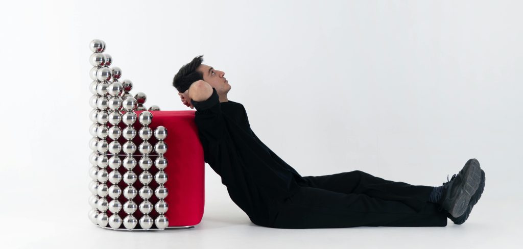 reza raeisifar with wishes chair designed by reza raeisifar and sade abar - abar studio